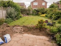 Knocking down the wall and removing the steps was hard work!